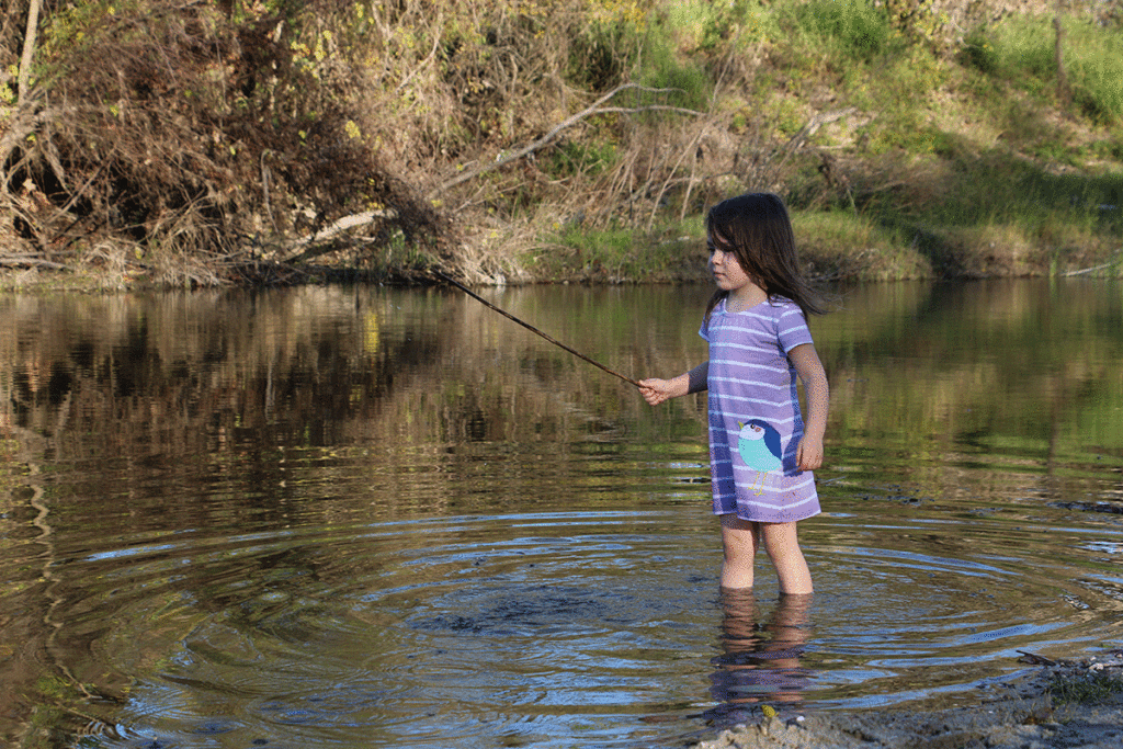 Photo of grand-niece Sylvie enjoying a warm winter outing on Coleto Creek. Photo by Anne Rokyta.